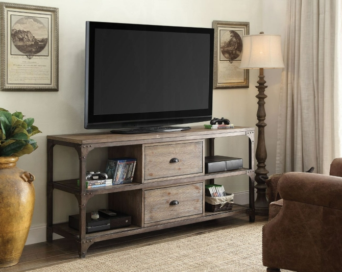 The Gorden TV stand versatility and style will blend masterfully in your living room area. The storage feature offers plenty of space to keep your entertainment components. Carefully constructed from selected wood and veneers in Weathered Oak Finish, and contrasting metal base in antique silver finish which gives this piece a industrial and sleek appeal.